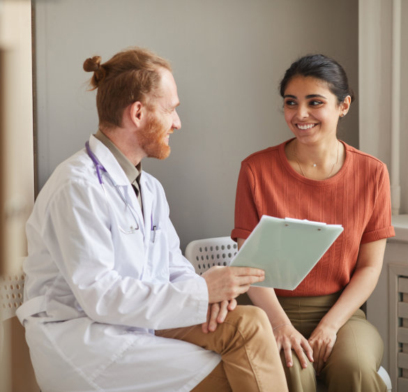 Doctor prescribing medicine to patient