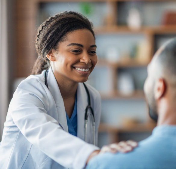 doctor touching patient shoulder