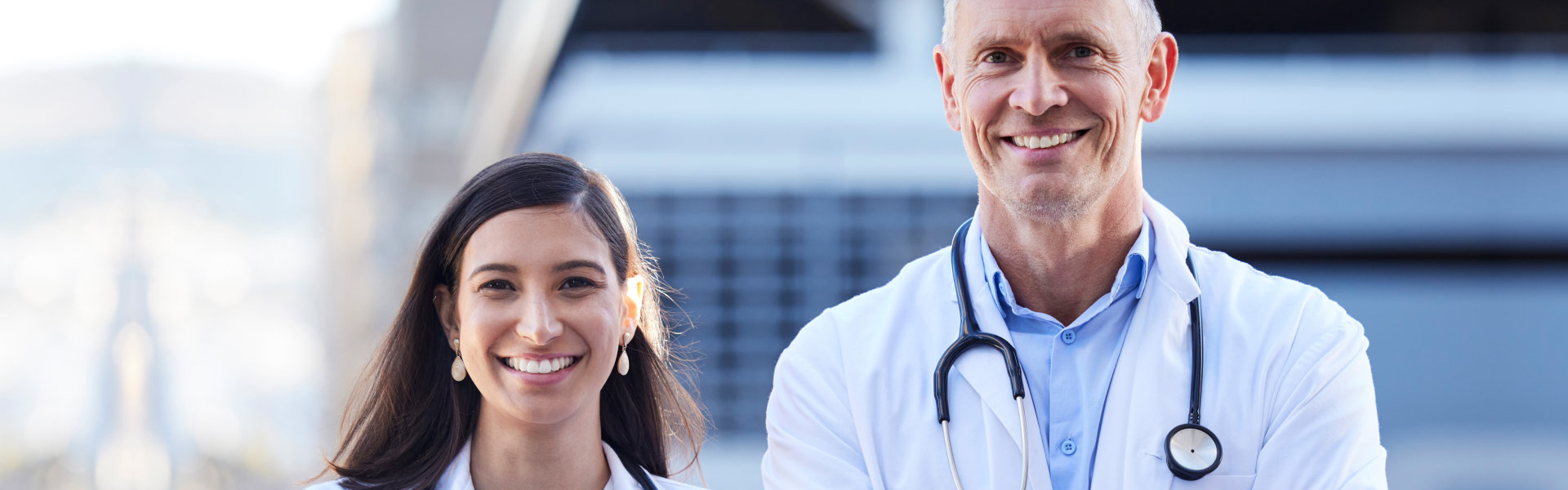 two doctors with folded arms