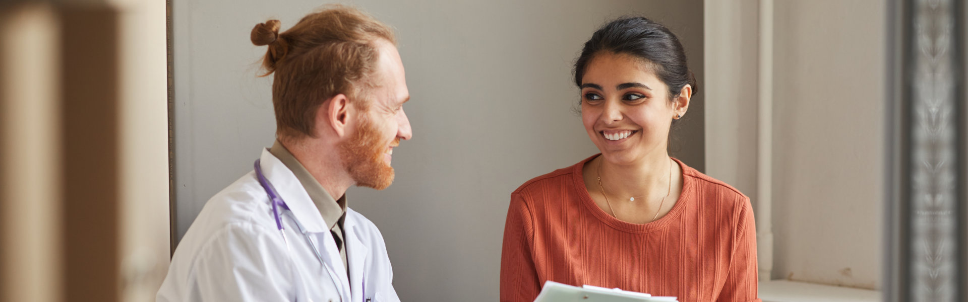 Doctor prescribing medicine to patient